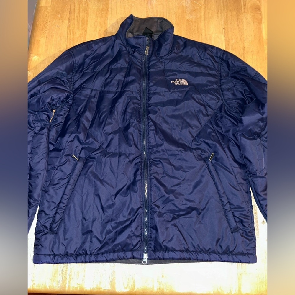 The north face men’s XL blue jacket coat light weight puffer?